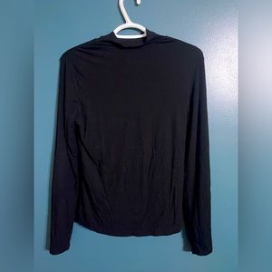 XS turtleneck, low neck fitted turtleneck all black long sleeve. Stretchy shirt